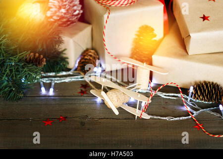 Close-up of Christmas composition on wooden background. Christmas toys and presents. Stock Photo