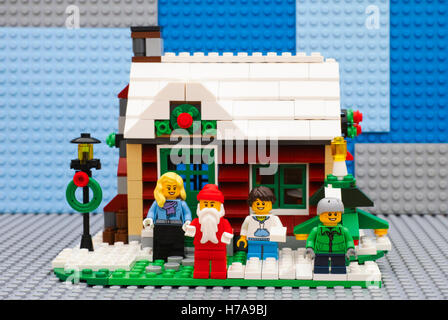 Tambov, Russian Federation - July 06, 2016 Lego Winter House ready for Christmas. Santa Claus, mother, son and daughter. Stock Photo