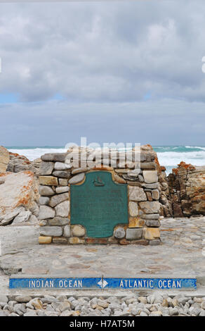 South Africa: the sign of Cape Agulhas, the southernmost tip of Africa where Atlantic and Indian Oceans meet Stock Photo