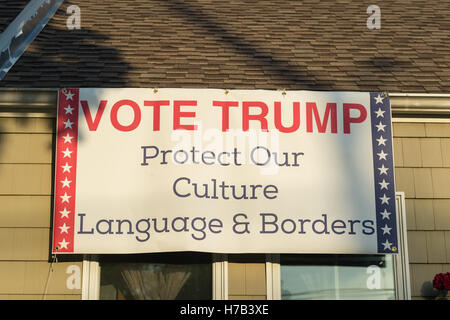 Bellmore, United States. 02nd Nov, 2016. Bellmore, New York, USA. November 2, 2016. Political banner 'VOTE TRUMP Protect Our Culture Language & Borders' supporting the nationalist Republican presidential candidate is near roof of Eileen Fuscaldo, who had a variety of pro-Trump anti-Clinton displays. Credit:  Ann E Parry/Alamy Live News Stock Photo