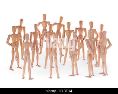 Group of wooden dummies. Group of people, crowd, community or social event concept. On white background Stock Photo