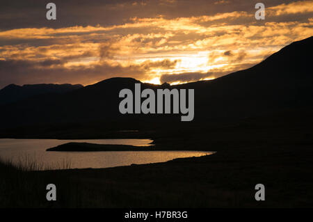 Autumnal sunset over the Inverpolly mountains, Ross and Cromarty, Scotland. Stock Photo