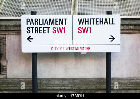 Parliament Street and Whitehall sign with arrows pointing in different directions. London, UK Stock Photo