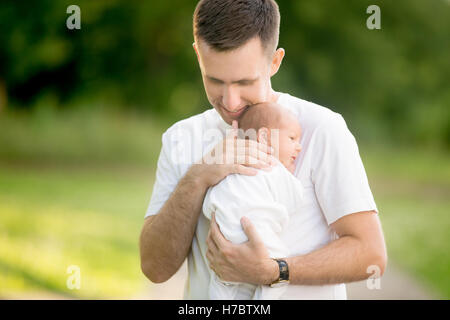Father holding newborn baby Stock Photo