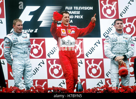 Michael Schumacher, Mika Häkkinen David Coulthard  Japan Podium 2000 Stock Photo