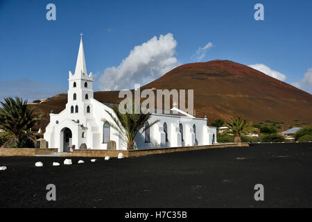 St Mary's Church in Georgetown on Ascension Island with Cross Hill in the background Stock Photo