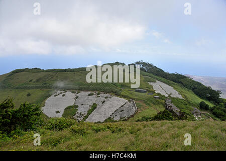 Bishop's Path passing the Water Catchment Area and the old Marine barracks on Green Mountain on Ascension Island Stock Photo