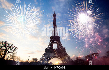 Abstract background of Eiffel tower with fireworks, Paris, France - New Year Stock Photo