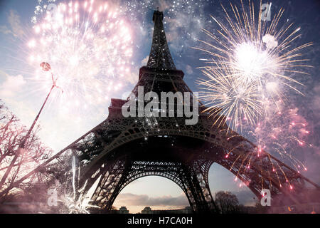 Abstract background of Eiffel tower with fireworks, Paris, France - New Year Stock Photo