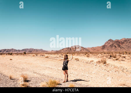 Photo of Girl at Mojave Desert near Route 66 in California Stock Photo