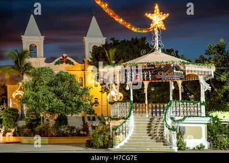 San Jose Church (ca. 1940) and gazebo, San Jose del Cabo Plaza decorated for Christmas, Baja California Sur, Mexico Stock Photo