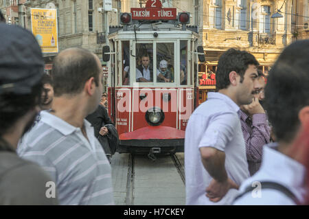 The vintage tram on Istiklal street in central Istanbul.  The tram operates an all-day regular service between Taksim square and Stock Photo
