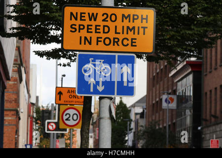 Traffic and cycling signs in Belfast city centre Stock Photo