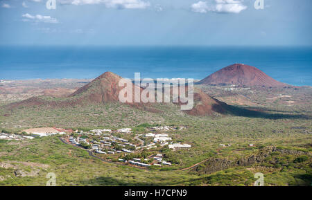 Ascension Island View from Green Mountain with volcanic topography and Two Boats village showing & Georgetown in the distance Stock Photo