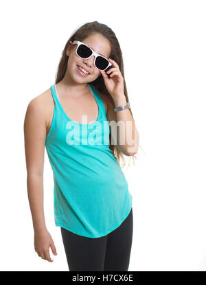 Smiling teenager girl wearing white rimmed sunglasses - isolated on white Stock Photo