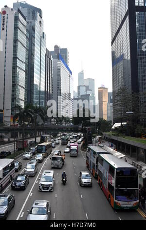 Hong Kong, China - Oct 29, 2016: Road traffic and Skyscrapers on Gloucester Road, Hong Kong Island. Stock Photo