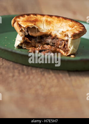 rustic meat and mushroom pie Stock Photo