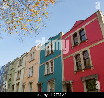 Colourful terrace of houses in Bristol with autumn tree. Stock Photo