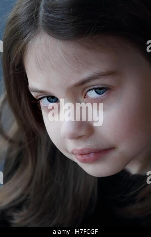 Portrait of a little girl crying. Stock Photo