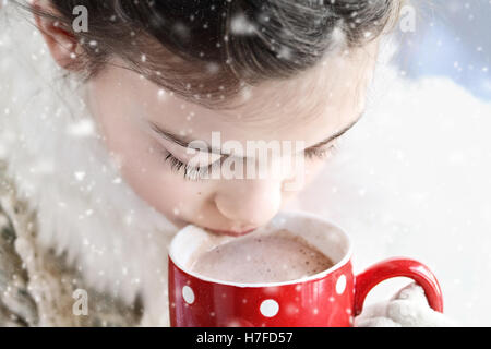 Mug and thermos of hot chocolate on a cold winter day Stock Photo - Alamy