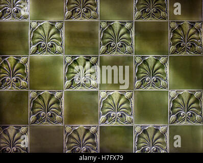 Old green Victorian decorative tiled background. Stock Photo