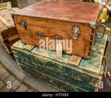 Retro wooden boxes for sale at a flea market Stock Photo - Alamy