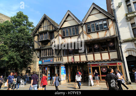 Historic half-timbered buildings on Cornmarket Street, city centre Oxford, England, UK Stock Photo