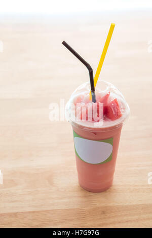 Watermelon smoothie on wooden table Stock Photo