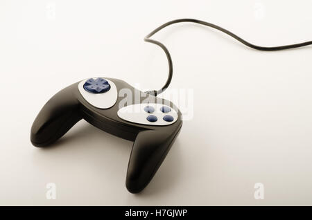 Black game controller isolated on a white background Stock Photo