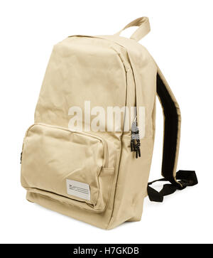 Cream backpack standing isolated on white background Stock Photo