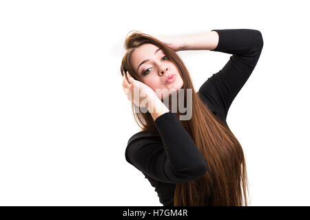 Emotion series of young and beautiful ukrainian girl - posing.The girl has green eyes and brown hair. Stock Photo