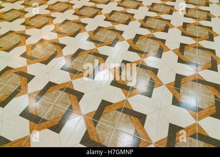 Floor tiled with patterns like parquet Stock Photo