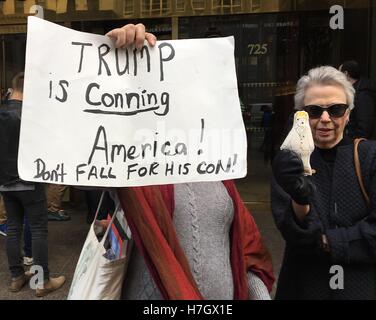 New York, NY, USA. 4th Nov, 2016. Anti-Trump protestor and woman holding Donald Trump voodoo dolls protest outside of Trump Tower in New York, New York on November 2, 2016. © Rainmaker Photo/Media Punch/Alamy Live News Stock Photo