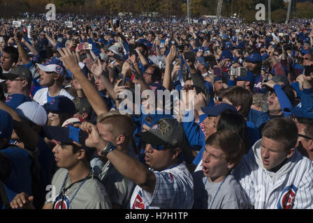 Chicago, Illinois, USA. 4th Nov, 2016. 5 Million ecstatic Chicagoans lined the parade route and filled Grant Park for the World Series Champions - the Chicago Cubs celebration on November 4, 2016. The parade started at Wrigley Field, home stadium of the Cubs followed Addison Street to Lake Shore Drive to North Michigan Avenue. It then proceded South on Columbus Drive to Balbo and on to Grant Park where a huge crowd in Cubs attire waited for them. Owner of the Cubs, Tom Ricketts addressed the gathering, along with Coach Joe Madden, and some of the Cubs players including MVP Ben Zobrist Stock Photo