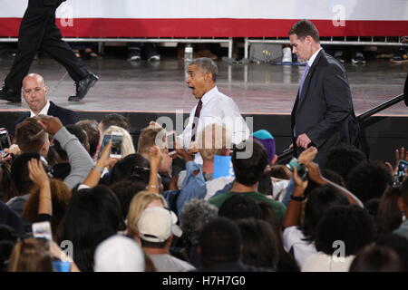 Charlotte, USA. 04th Nov, 2016. President Barack Obama shakes hands, gives hugs, and congregates with the crowd after his speech in support of the Democratic Presidential Nominee Hillary Clinton at the PNC Music Pavilion in Charlotte, NC on November 4th, Stock Photo