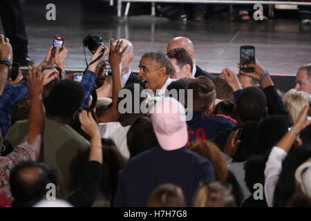 Charlotte, USA. 04th Nov, 2016. President Barack Obama shakes hands, gives hugs, and congregates with the crowd after his speech in support of the Democratic Presidential Nominee Hillary Clinton at the PNC Music Pavilion in Charlotte, NC on November 4th, Stock Photo