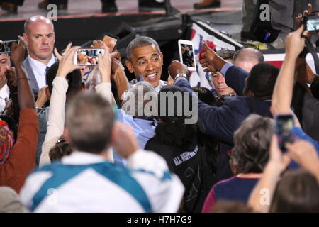 Charlotte, USA. 04th Nov, 2016. President Barack Obama shakes hands, gives hugs, and congregates with the crowd after his speech in support of the Democratic Presidential Nominee Hillary Clinton at the PNC Music Pavilion in Charlotte, NC on November 4th, Stock Photo