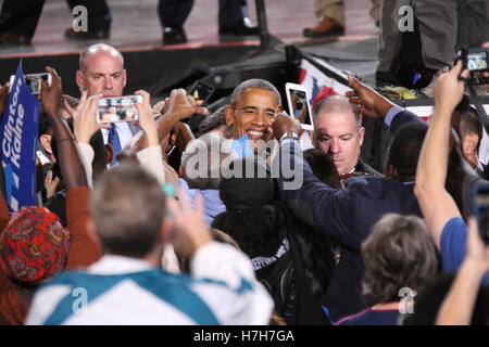 Charlotte, USA. 04th Nov, 2016. President Barack Obama shakes hands, gives hugs, and congregates with the crowd after his speech in support of the Democratic Presidential Nominee Hillary Clinton at the PNC Music Pavilion in Charlotte, NC on November 4th, Stock Photo