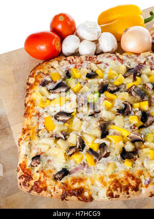 Garlic bread pizza with chicken, mushroom, peppers, onion and cheese Stock Photo