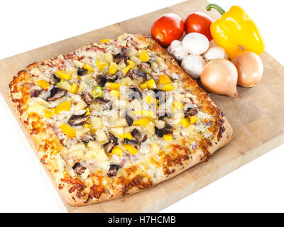 Freshly baked pizza topped with seasoned chicken, mushroom, peppers, onion and cheese. Stock Photo