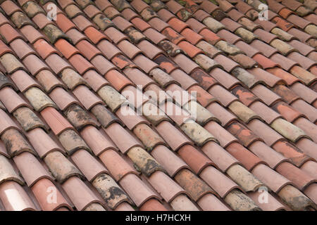 Roof shingles. Red roof shingles. Italy Stock Photo