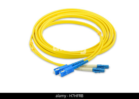 Fiber optics single mode patch cord SC to LC connector, isolated on white background Stock Photo