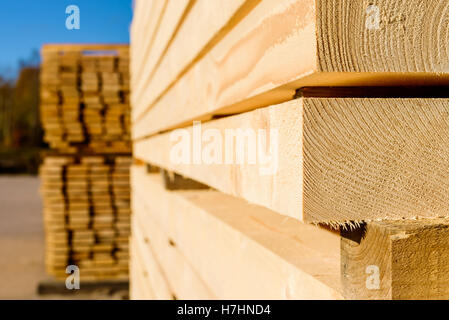 Corner parts of stacked lumber or timber Stock Photo - Alamy
