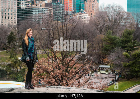 Photo of Girl in front of trees at the Central Park in Manhattan, New York City Stock Photo