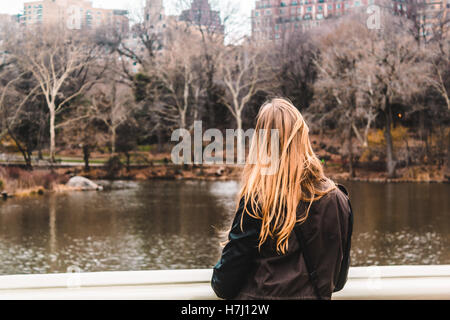 Photo of Girl in front of trees at the Central Park in Manhattan, New York City Stock Photo