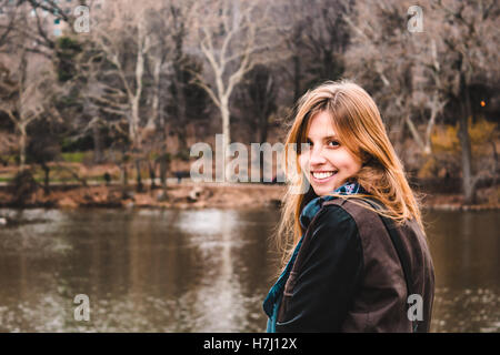 Photo of Girl in front of trees at the Central Park in Manhattan, New York City Stock Photo