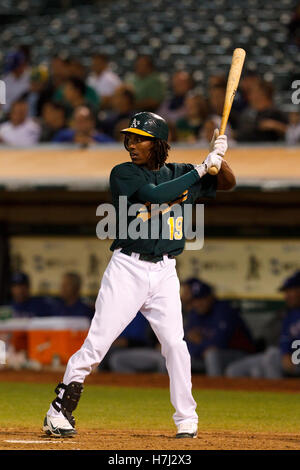 September 20, 2011; Oakland, CA, USA;  Oakland Athletics second baseman Jemile Weeks (19) at bat against the Texas Rangers during the eighth inning at O.co Coliseum.  Texas defeated Oakland 7-2. Stock Photo