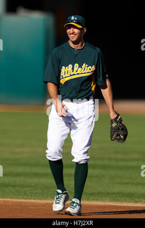 September 21, 2011; Oakland, CA, USA;  Oakland Athletics second baseman Adam Rosales (7) warms up before the game against the Texas Rangers at O.co Coliseum. Texas defeated Oakland 3-2. Stock Photo