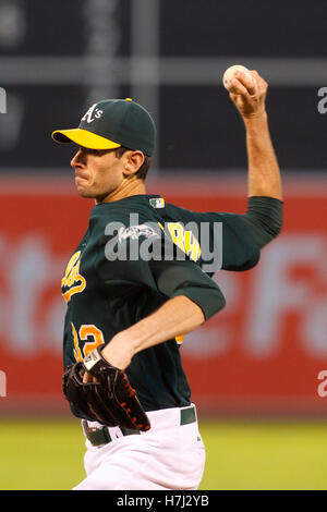 September 21, 2011; Oakland, CA, USA;  Oakland Athletics starting pitcher Brandon McCarthy (32) pitches against the Texas Rangers during the first inning at O.co Coliseum. Texas defeated Oakland 3-2. Stock Photo