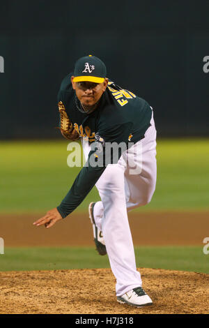 September 21, 2011; Oakland, CA, USA;  Oakland Athletics relief pitcher Brian Fuentes (57) pitches against the Texas Rangers during the ninth inning at O.co Coliseum. Texas defeated Oakland 3-2. Stock Photo